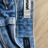 Женский пуховик Uniqlo, джинсы Mavi, худи, сумка Coccinelle 5