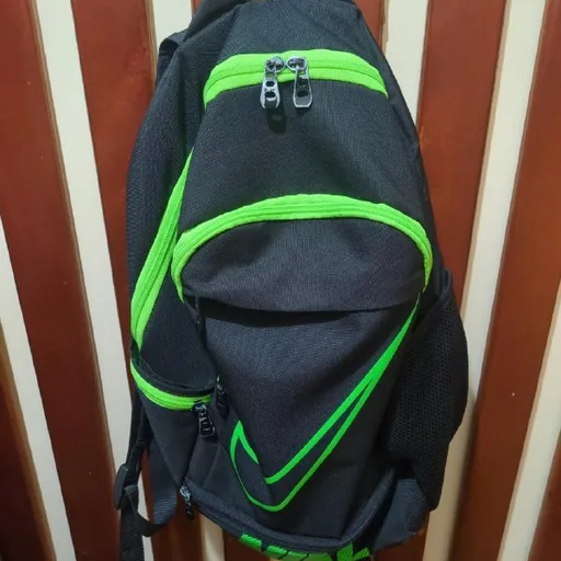 Black and green Nike backpack