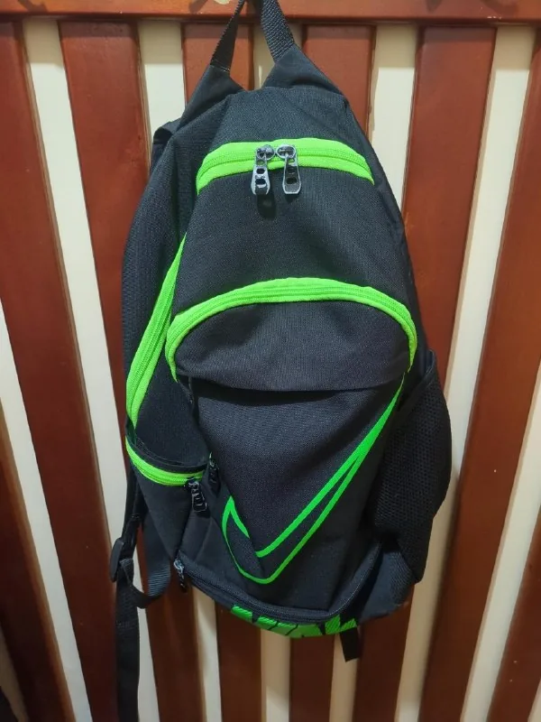 Black and green Nike backpack