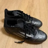 Шорты Just Cavalli, кроссовки Nike Air Force, бутсы Adidas, свитер Gucci 4