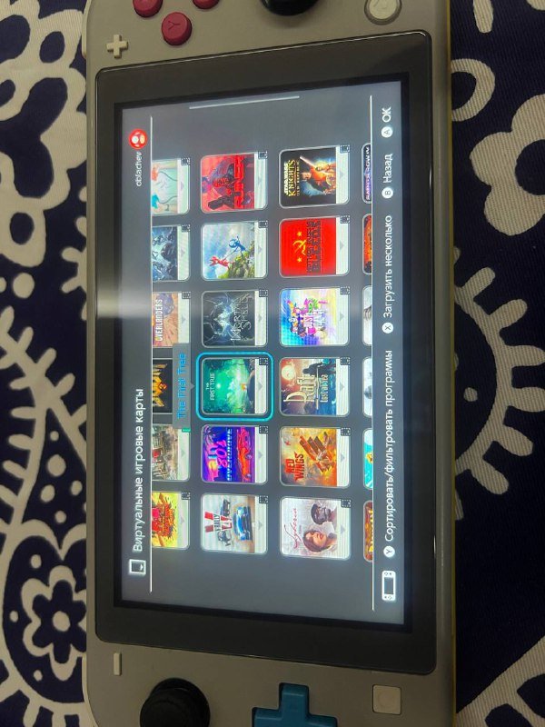 Nintendo Switch lite с играми и чехлом 5