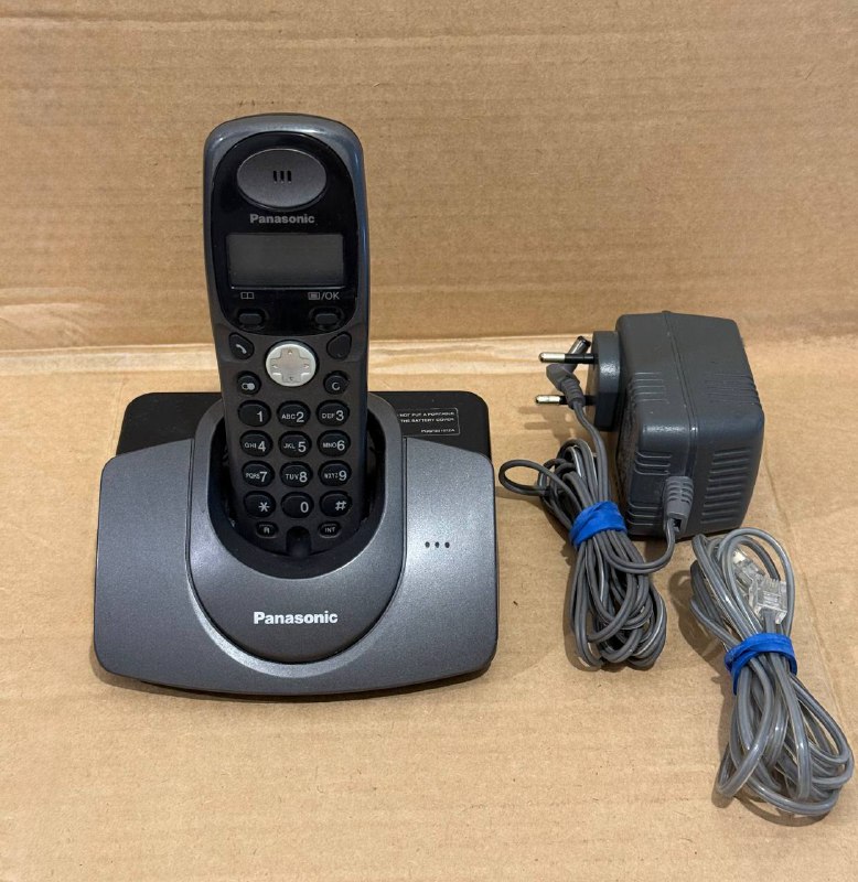 Panasonic cordless phone with charger and cable