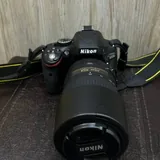 Nikon D5100 с объективом Nikon 55–300mm VR 1