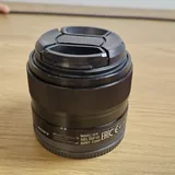 Sony a5100 camera, Sony 18–55 mm and 35 mm lenses, charger 7