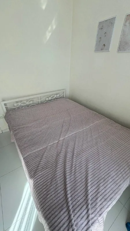 Bed with 150×200 mattress and wrought-iron headboard 1