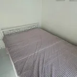 Bed with 150×200 mattress and wrought-iron headboard 1