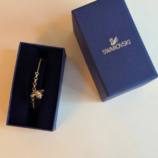 Браслет Swarovski, браслет Adinas, сережки TOUS, подвеска MOVA