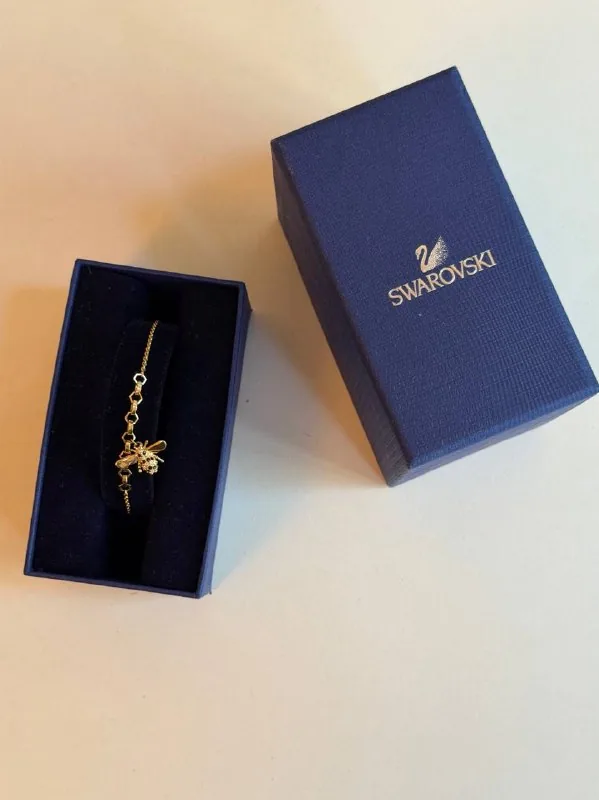 Браслет Swarovski, браслет Adinas, сережки TOUS, подвеска MOVA 1