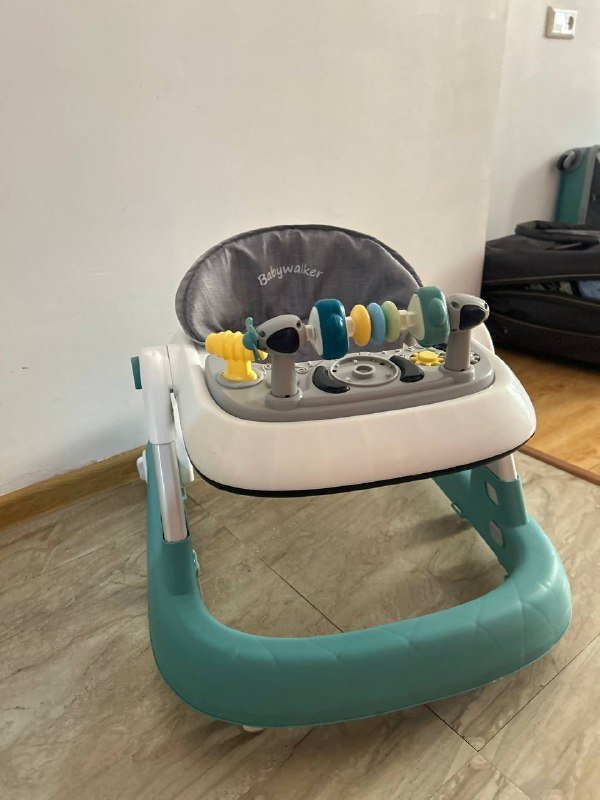 Детские ходунки-каталка с игровой панелью