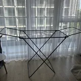 Сушилка для белья, плед, ваза, бутылка, подложки на стол, книги, сумка поясная, парфюмерная вода, автозагар, скраб для кожи головы 1