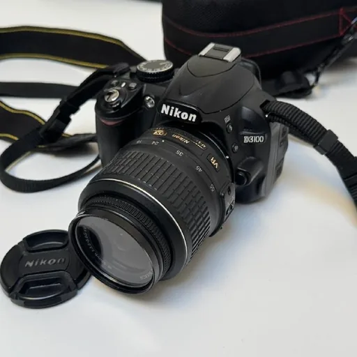 Фотоаппарат Nikon D3100 с объективом 18–55 мм