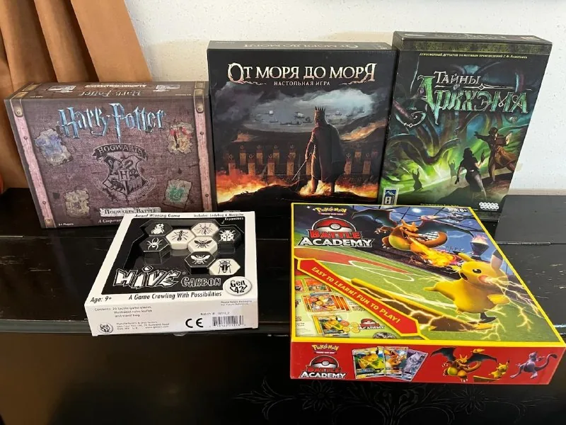 Hive Carbon, От моря до моря, Тайны Аркхема, Pokemon Battle Academy, Harry Potter Hogwarts Battle