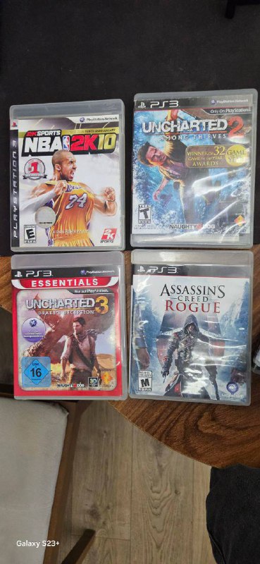 PS4 500GB with 2 controllers and games, PS3 250GB with games 7