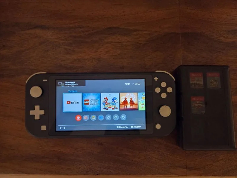 Nintendo Switch Lite, холдер для картриджей, 3 игры 1