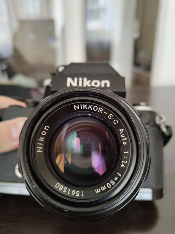Фотоаппарат Nikon F2 с объективом Nikkor S.C 50mm 1.4 и шахтой 2