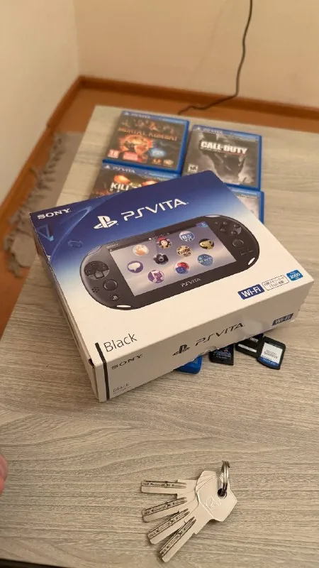 PS Vita с картой памяти 256 GB и играми 1