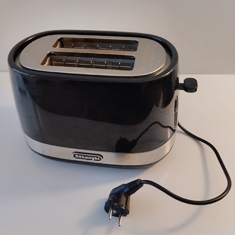Тостер DeLonghi черный, б/у, хорошее состояние 2