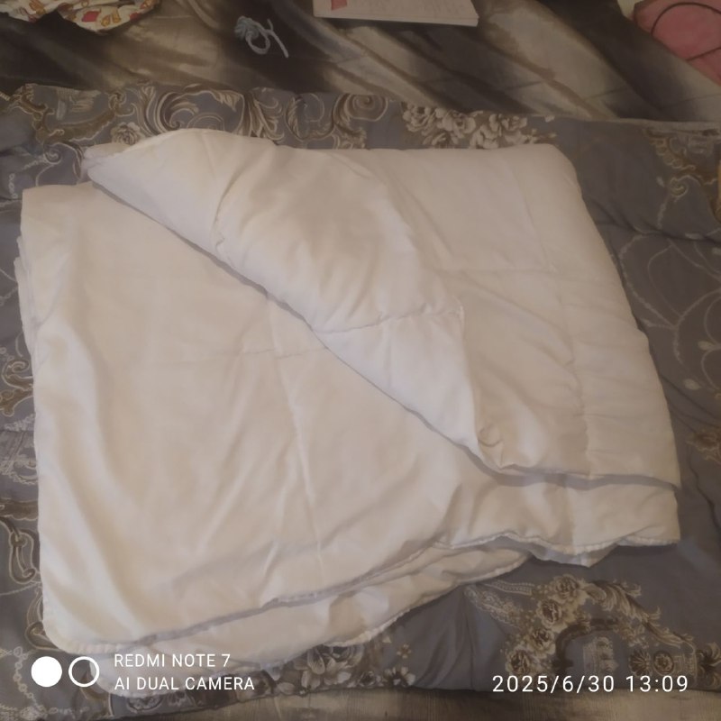 Одеяло лёгкое тёплое 1.40*2.00