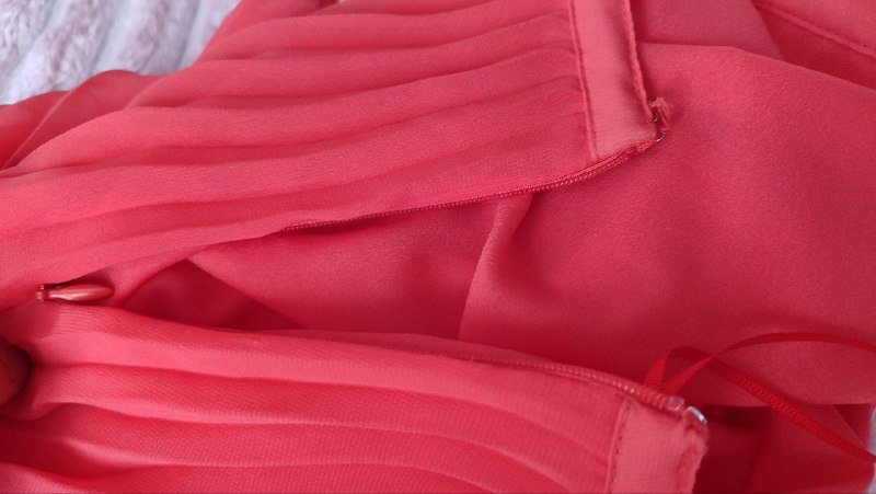 Оранжево-коралловая юбка гармошка на змейке сбоку 2