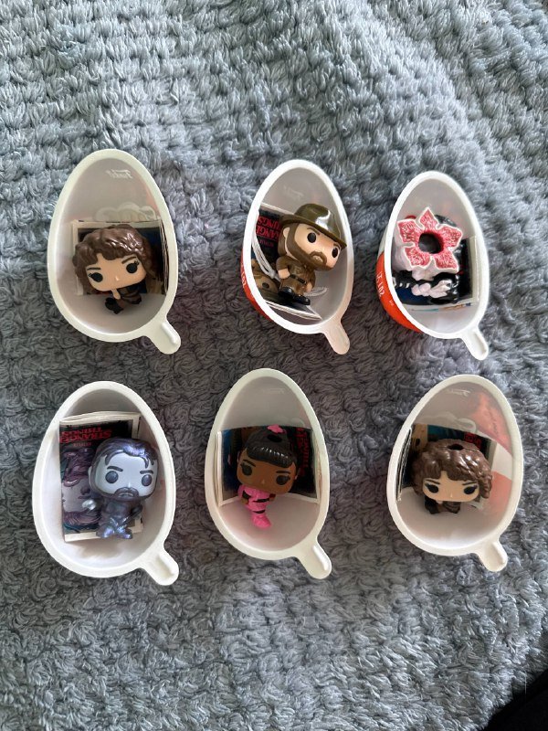 Фигурки в капсулах из коллекции осд