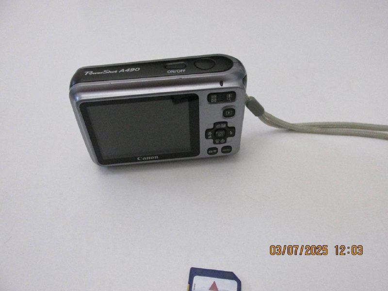 Xbox 360 elite with games and Canon Power Shot 7