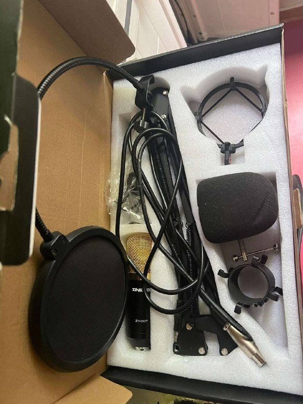 Zingyou microfono komplekti saksesfuli
