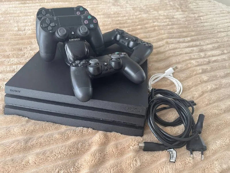 PS4 Pro, 1TB, 4 джойстика, зарядная док-станция 1