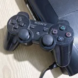PS3 с джойстиком, кабелями и дисками 3