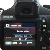 Зеркальная камера Canon Rebel T3i с объективом 5