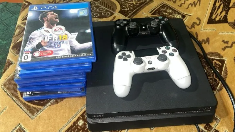 PlayStation 4 Slim 1TB, 2 геймпада, 8 игр 1
