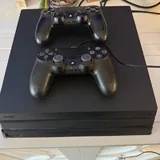 Sony PlayStation 4 Pro с двумя контроллерами 1
