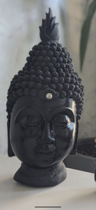 Фигура головы Будды