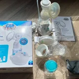 Электрический молокоотсос Canpol EasyStart, бутылочка NUK 2