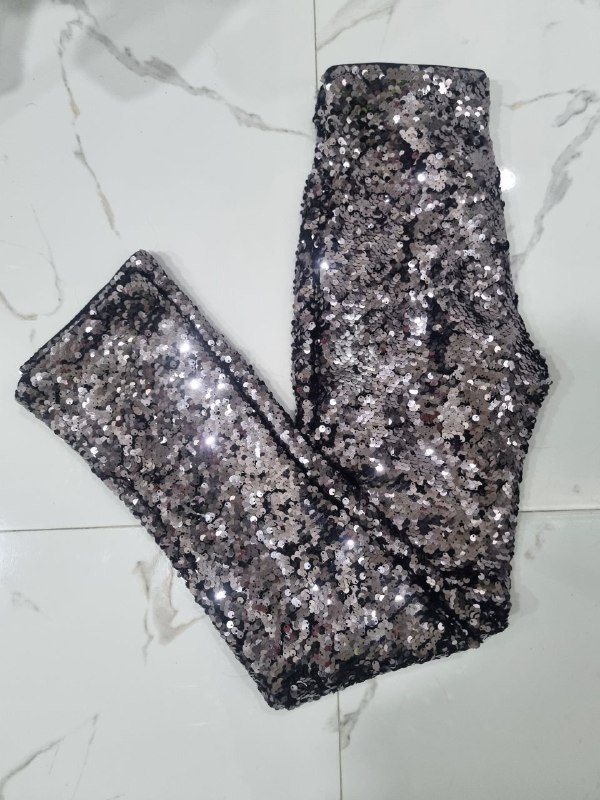 Штаны в пайетках H&M