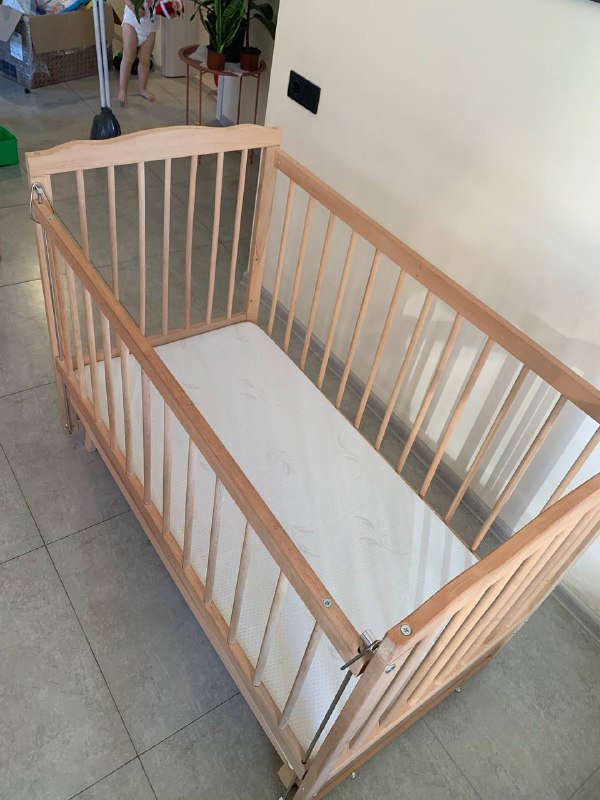 Детские кроватки с маятником