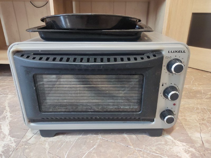 Электрическая духовая печь с комплектом посуды