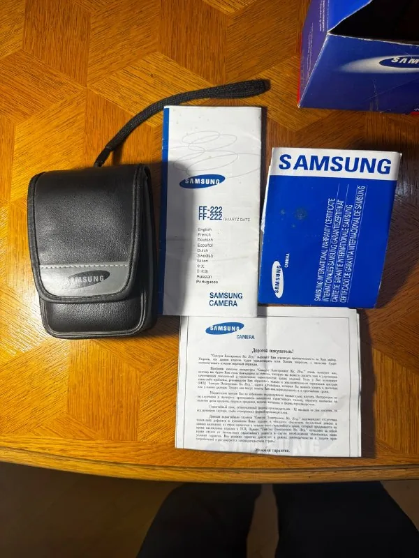 Книга, фотоаппарат, часы, очки, браслет, панама 6