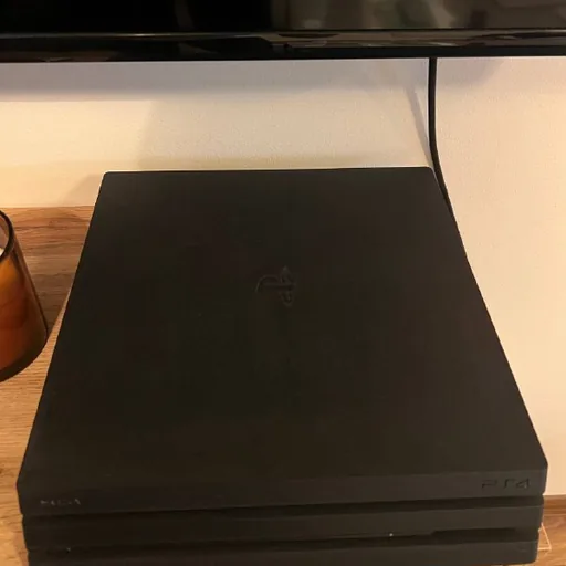 PlayStation 4 Pro с 3 играми на дисках