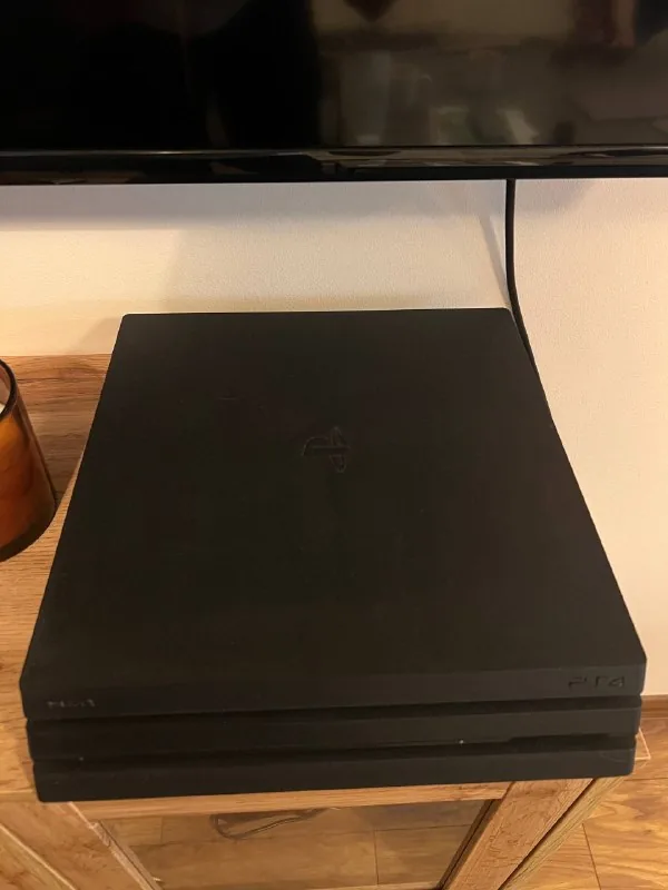 PlayStation 4 Pro с 3 играми на дисках 1