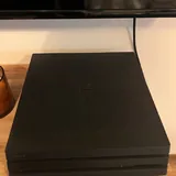 PlayStation 4 Pro с 3 играми на дисках 1