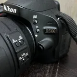 Nikon D5100 с объективом Nikon 55–300mm VR 6