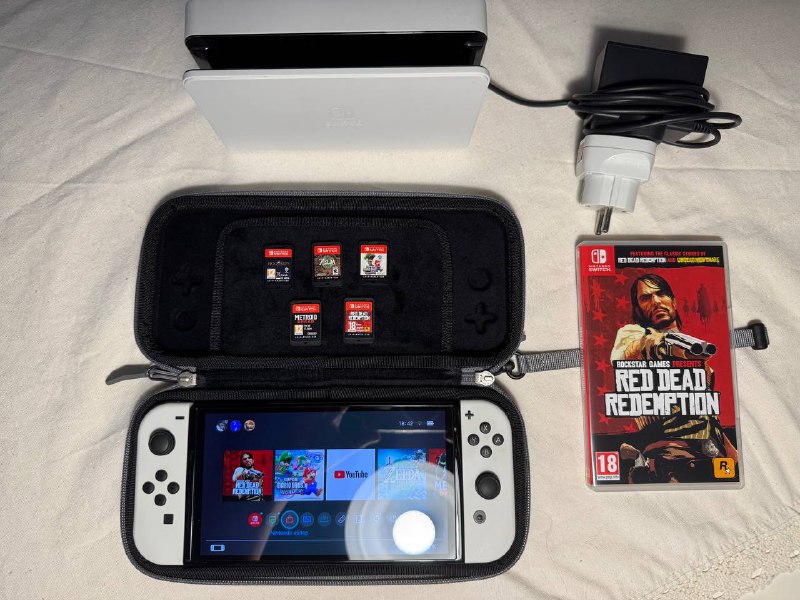 Nintendo Switch OLED, игры, сумка для переноски 4
