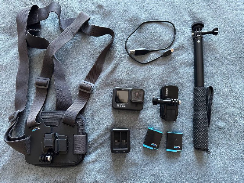 GoPro 9 with two batteries and charger, chest mount, clip mount
