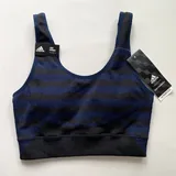 Футболки Uniqlo, спортивный топ Adidas Marimekko, сумка Marc Jacobs, джинсы Uniqlo JW Anderson 4