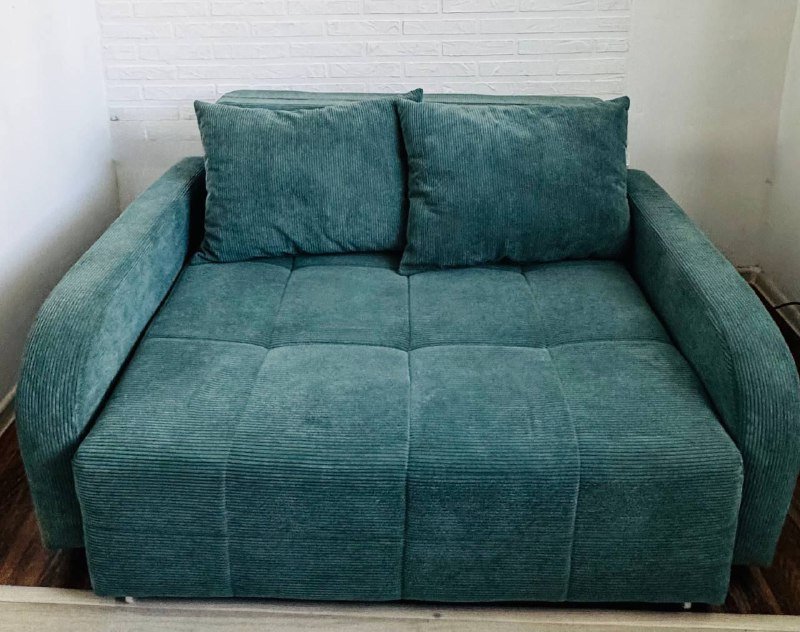 Диван-кровать изумрудного цвета