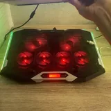 Мотоциклетный шлем, духовка с посудой, подставка для ноутбука 3