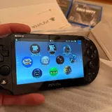 PS Vita с картой памяти 256 GB и играми 7