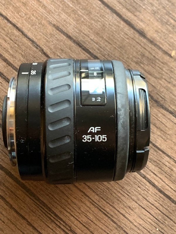 Пленочный фотоаппарат Minolta 7000AF с объективом и вспышкой, Цифровой фотоаппарат Panasonic LUMIX DMC-G2 с объективами и аксессуарами 2