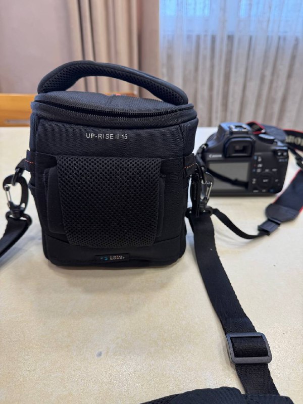 Новый фотоаппарат Canon EOS 1100D, сумка 4