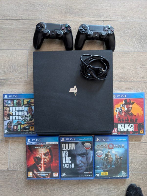 PS4 Pro 1TB, 2 джойстика, 5 игр